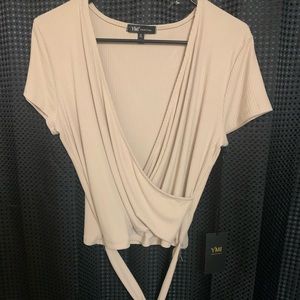 Ymi collections v cut top with tie on the side.